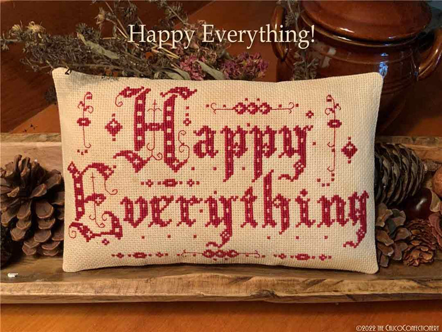 A stitched preview of the counted cross stitch pattern Happy Everything by The Calico Confectionery