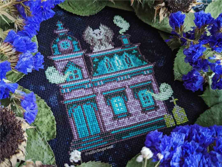 A stitched preview of the counted cross stitch pattern Haunted Gargoyle Mansion by StitchSprout