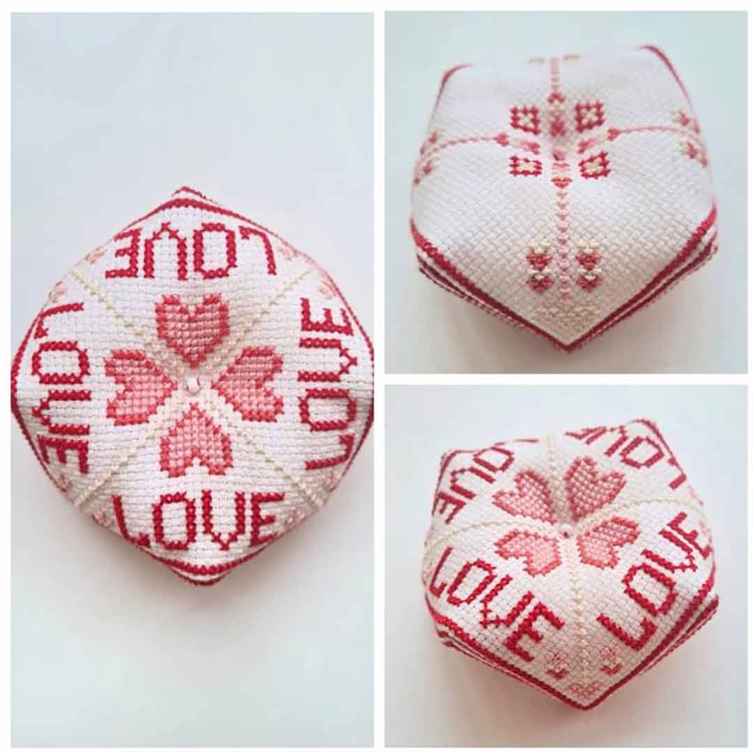 A stitched preview of the counted cross stitch pattern Hearts Biscornu by Kate Spiridonova