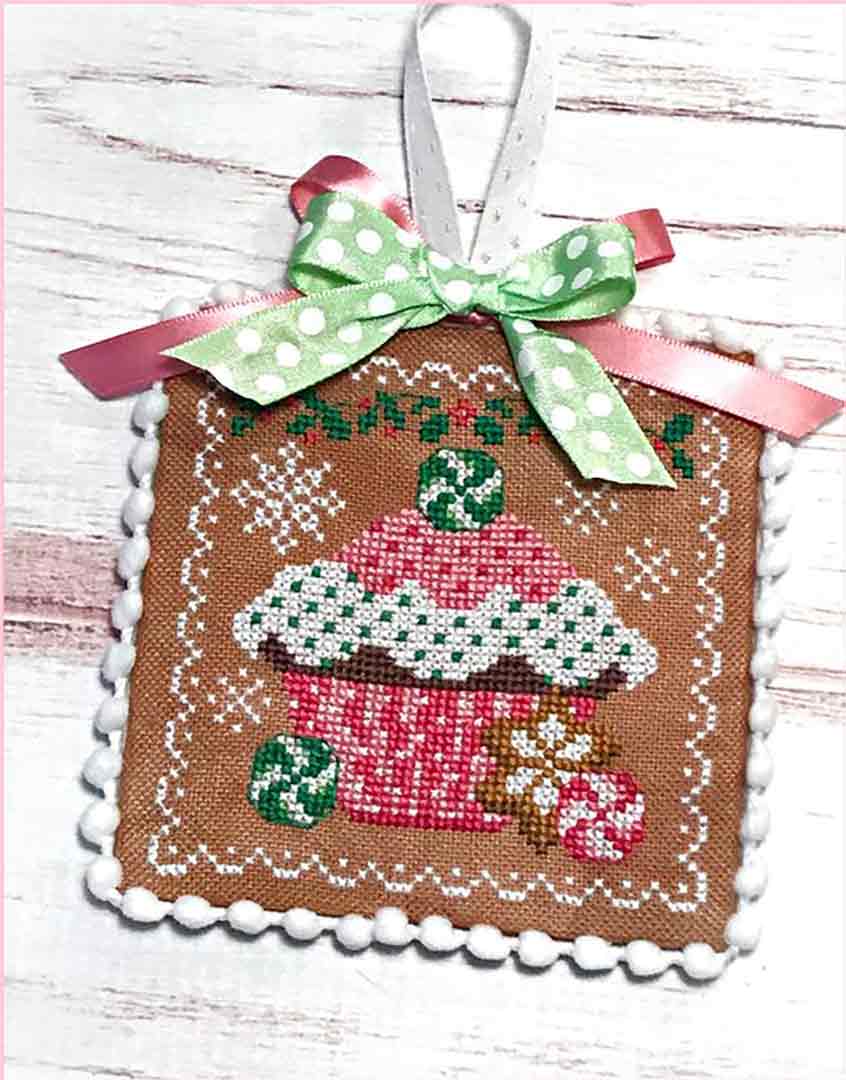 A stitched preview of the counted cross stitch pattern Holiday Cupcake by Sugar Stitches Design