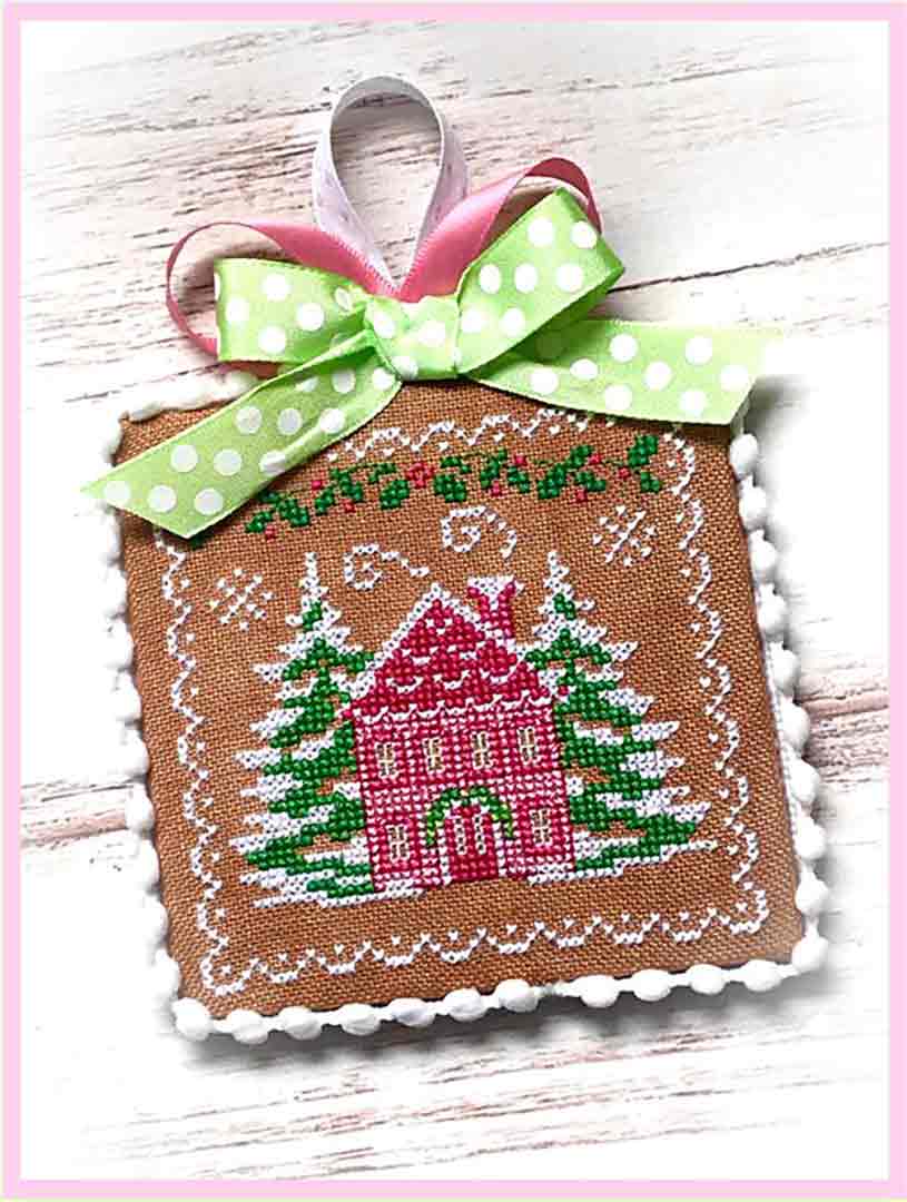 A stitched preview of the counted cross stitch pattern Holiday Home by Sugar Stitches Design