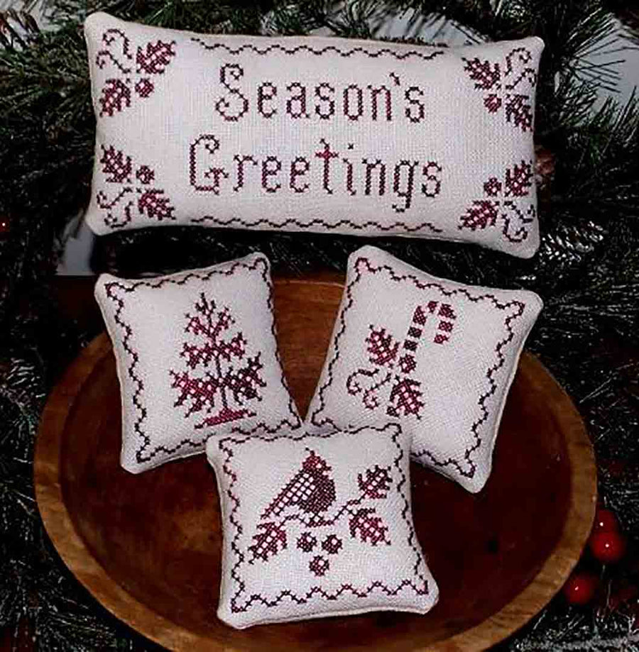 A stitched preview of the counted cross stitch pattern Holiday Samplings Christmas Ornaments by Plum Pudding NeedleArt