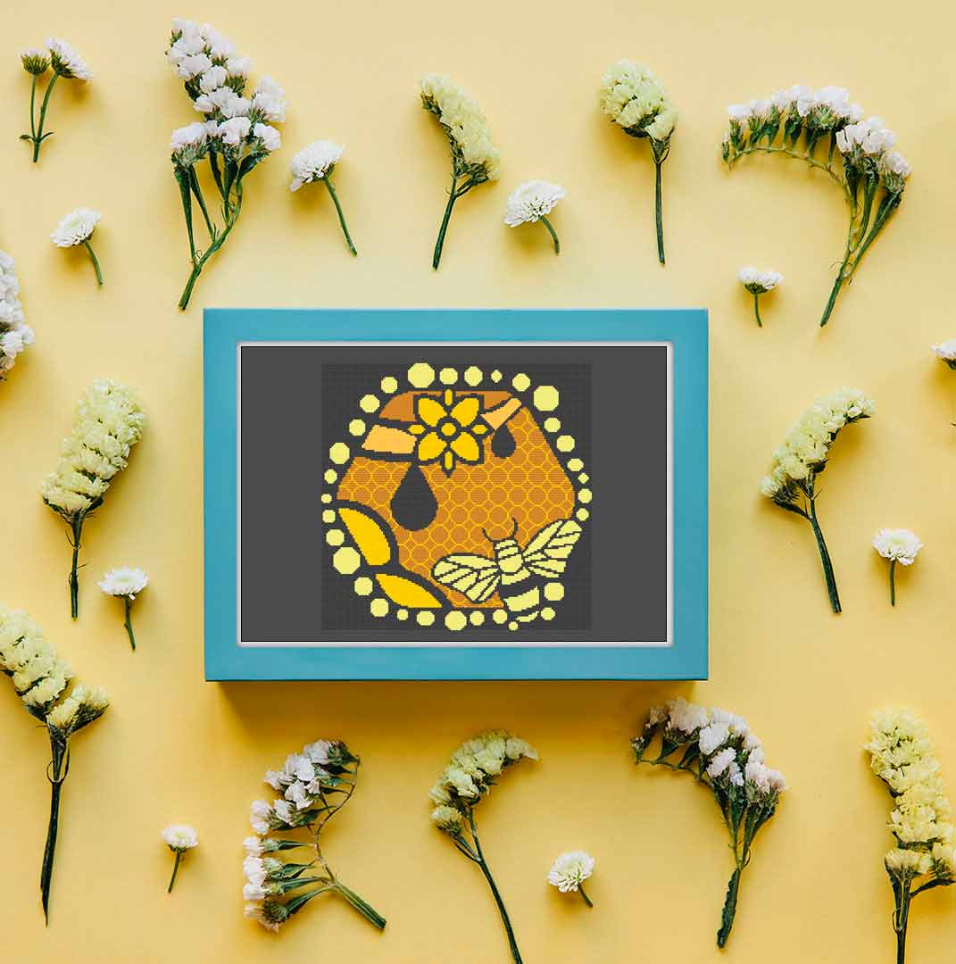 A stitched preview of the counted cross stitch pattern "Honey Bee" by Stitch Wit