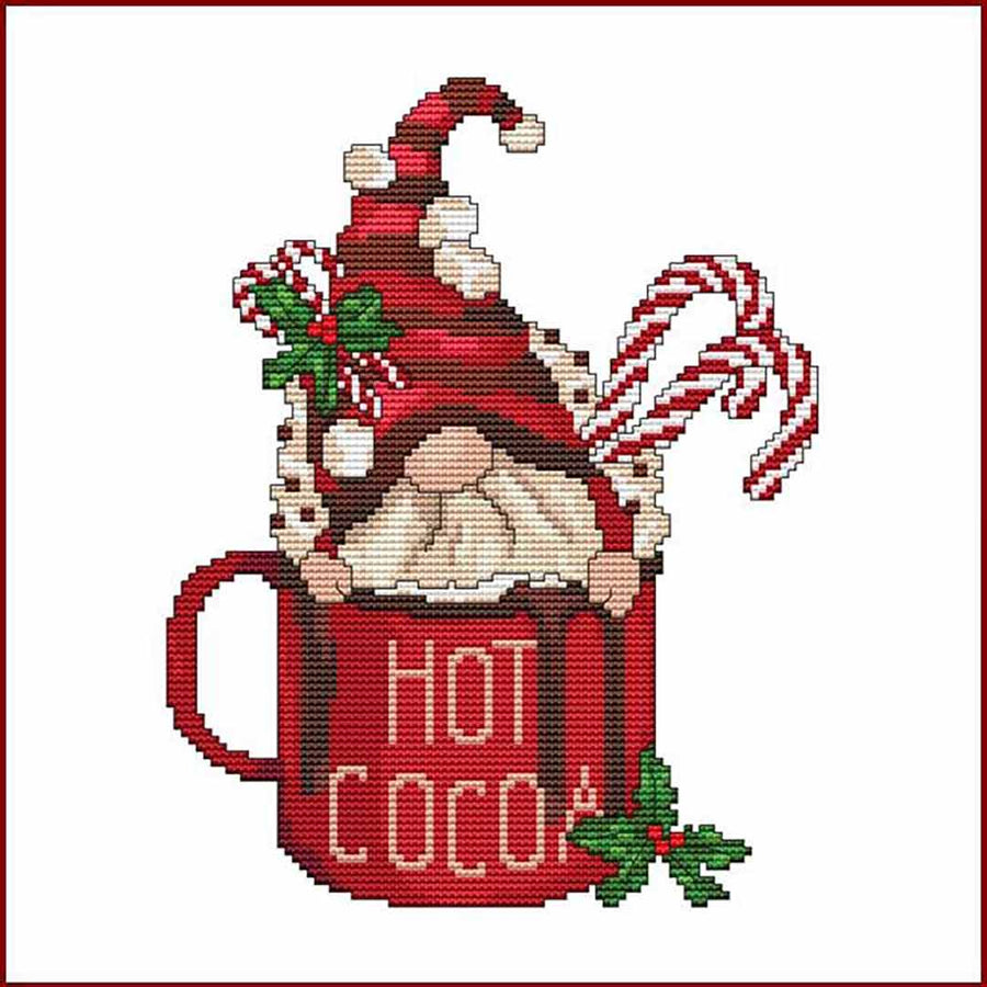 A stitched preview of the counted cross stitch pattern Hot Cocoa Gnome Mug by Marcia Manning