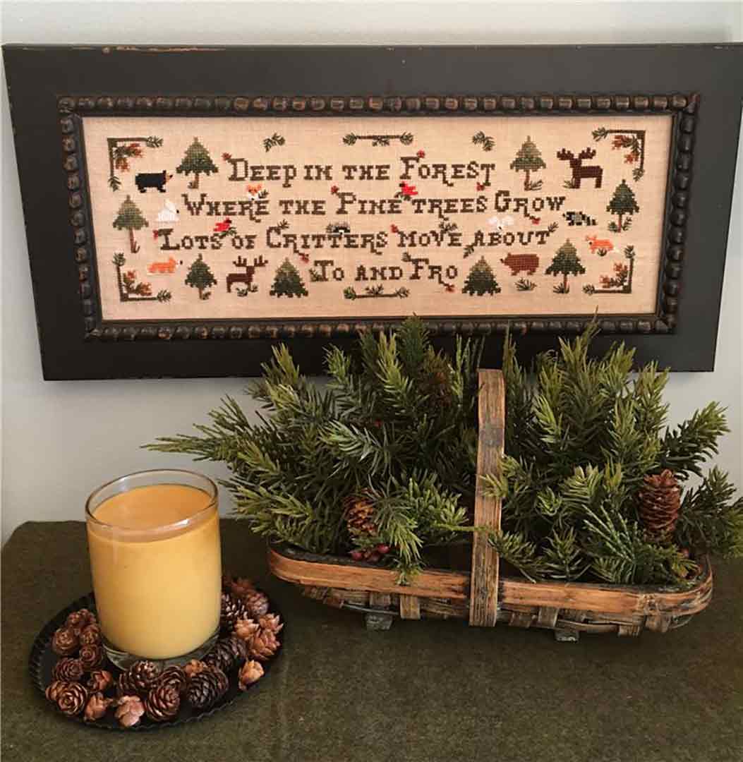 A stitched preview of the counted cross stitch pattern In The Forest by Prairie Grove Peddler