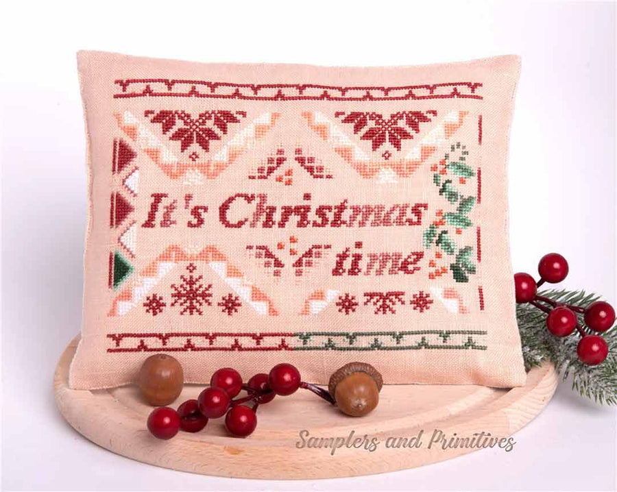 A stitched preview of the counted cross stitch pattern It's Christmas Time by Samplers and Primitives