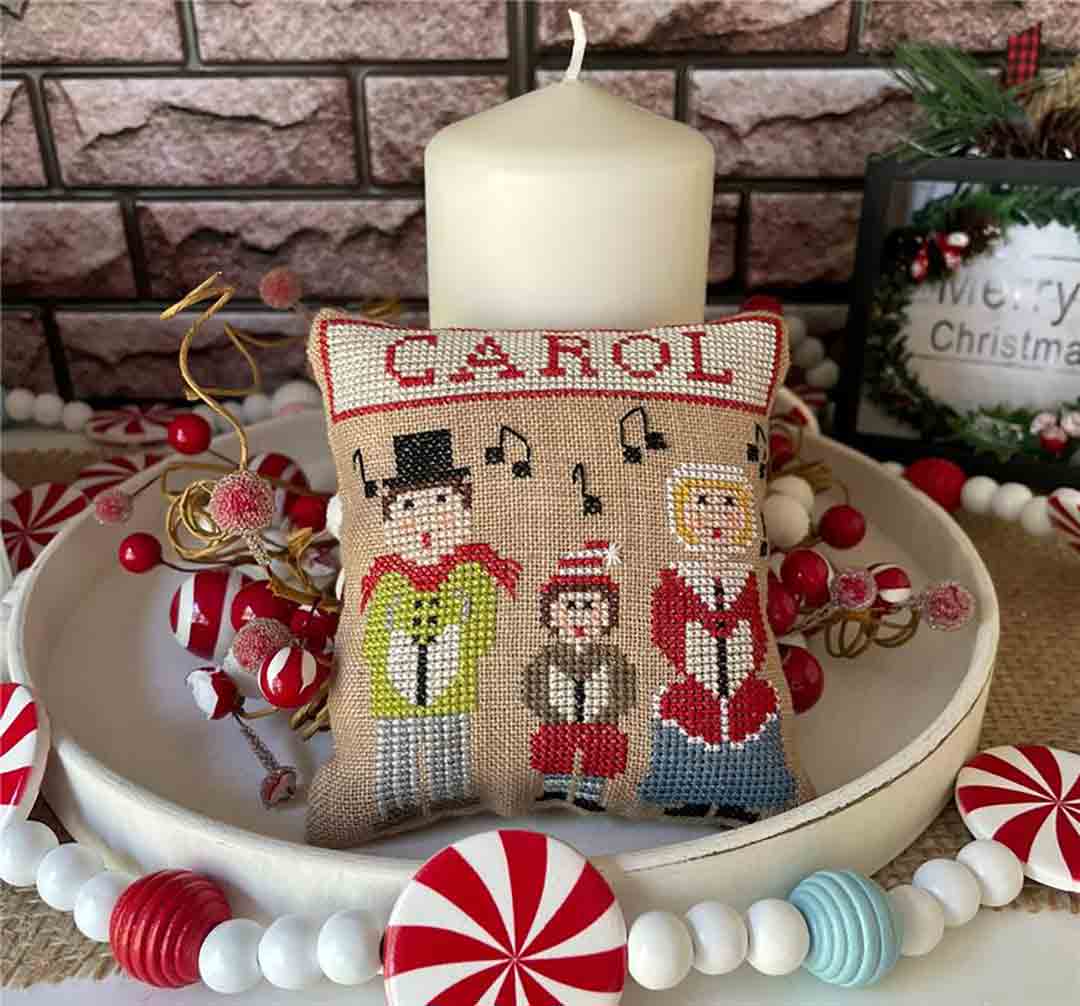 A stitched preview of the counted cross stitch pattern Joyful Christmas - Carol by Mani di Donna Design