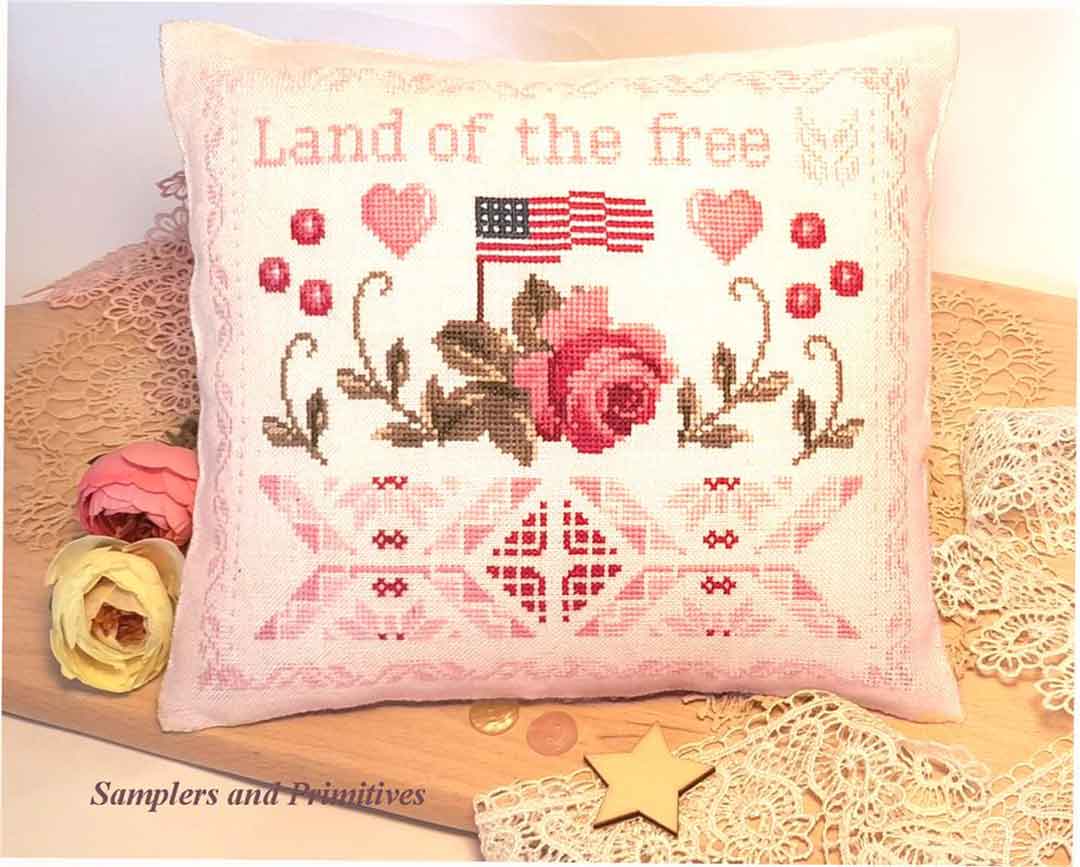 A stitched preview of the counted cross stitch pattern Land Of The Free by Samplers and Primitives