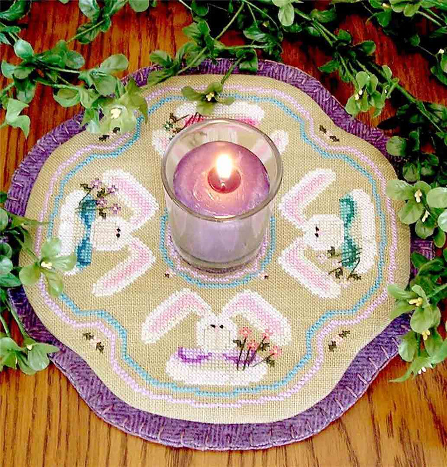 A stitched preview of the counted cross stitch pattern Little Candle Mats - Bunnies by Prairie Grove Peddler