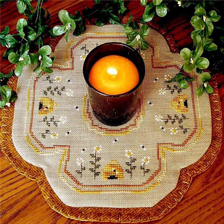 A stitched preview of the counted cross stitch pattern Little Candle Mats - Honey Bees by Prairie Grove Peddler