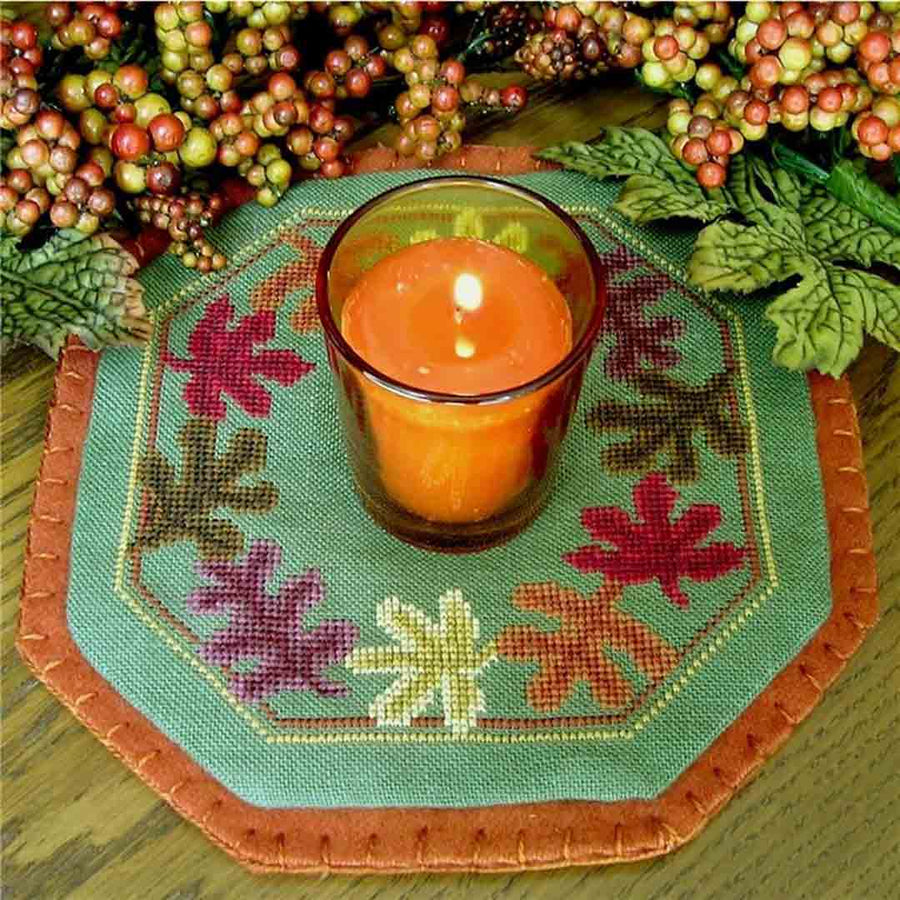 A stitched preview of the counted cross stitch pattern Little Candle Mats - Leaves by Prairie Grove Peddler