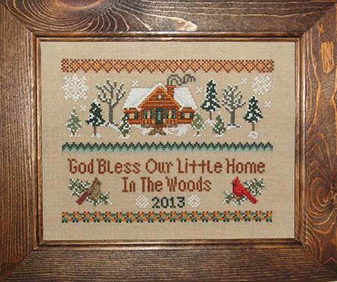 A stitched preview of the counted cross stitch pattern Little Home In The Woods by Janis Lockhart
