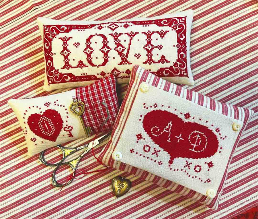 A stitched preview of the counted cross stitch pattern Lotsa Love Sampler Of Smalls by The Calico Confectionery