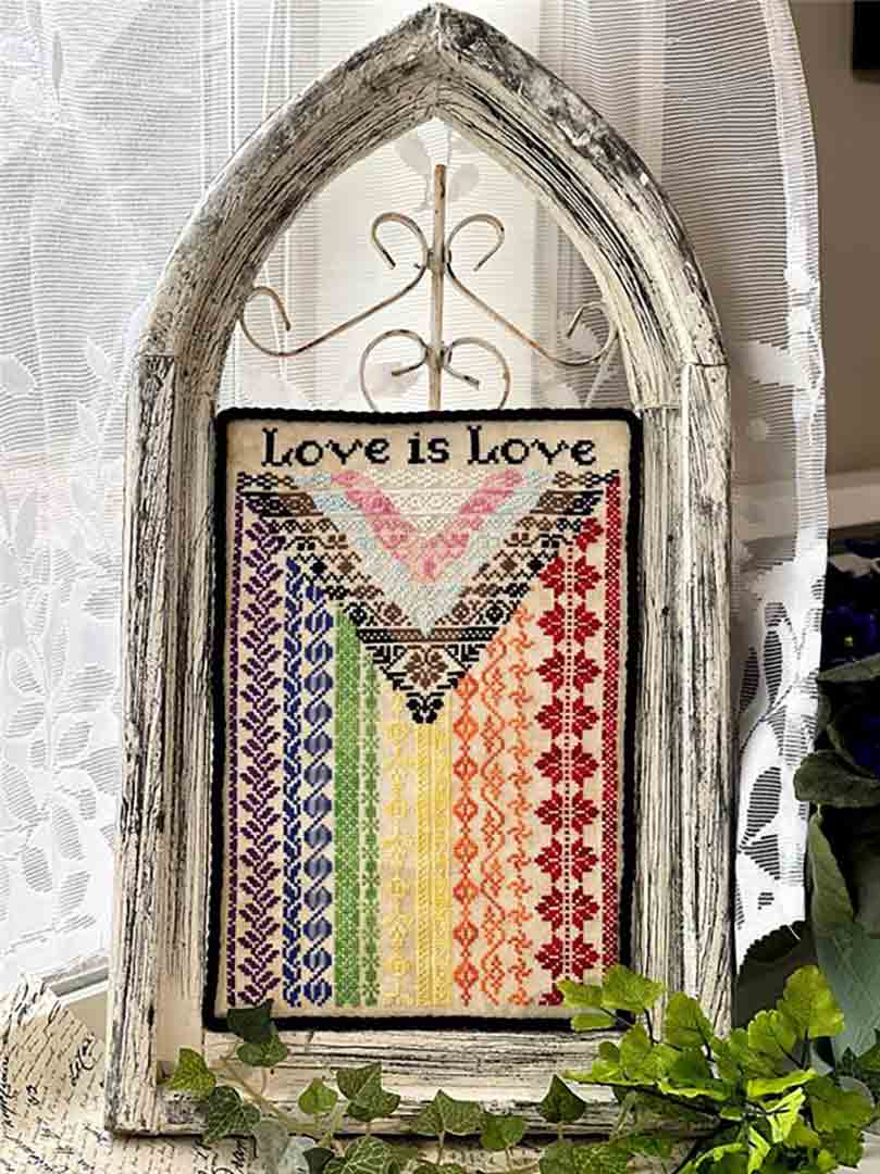 A stitched preview of the counted cross stitch pattern Love Is Love by Jan Hicks Creates