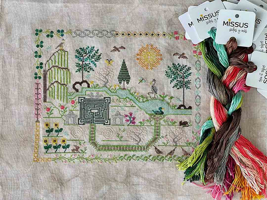 A stitched preview of the counted cross stitch pattern Meditation Garden by Jan Hicks Creates