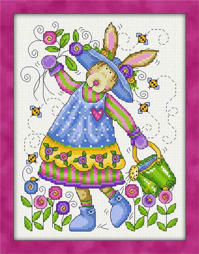 A stitched preview of the counted cross stitch pattern Miss Bunny's Garden by Joan A Elliott