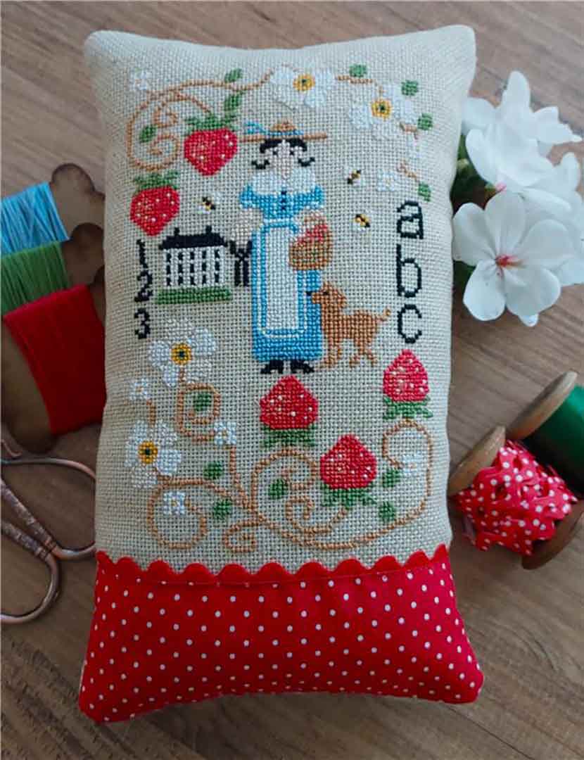 A stitched preview of the counted cross stitch pattern Miss Strawberry by Twin Peak Primitives