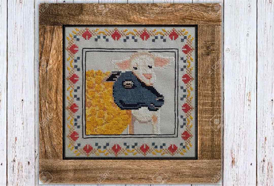 A stitched preview of the counted cross stitch pattern Mother's Love by Twin Peak Primitives