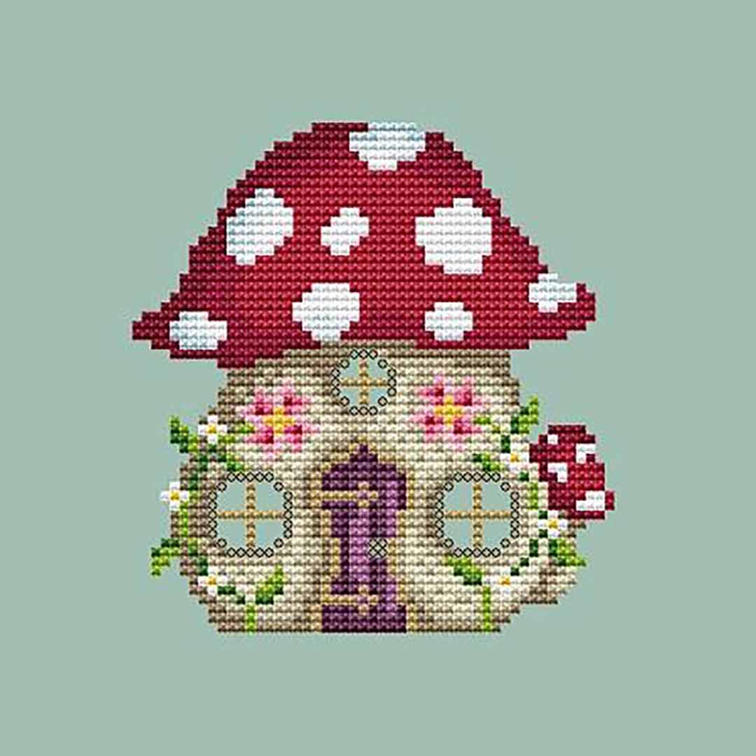 A stitched preview of the counted cross stitch pattern Mushroom House by Shannon Christine Designs