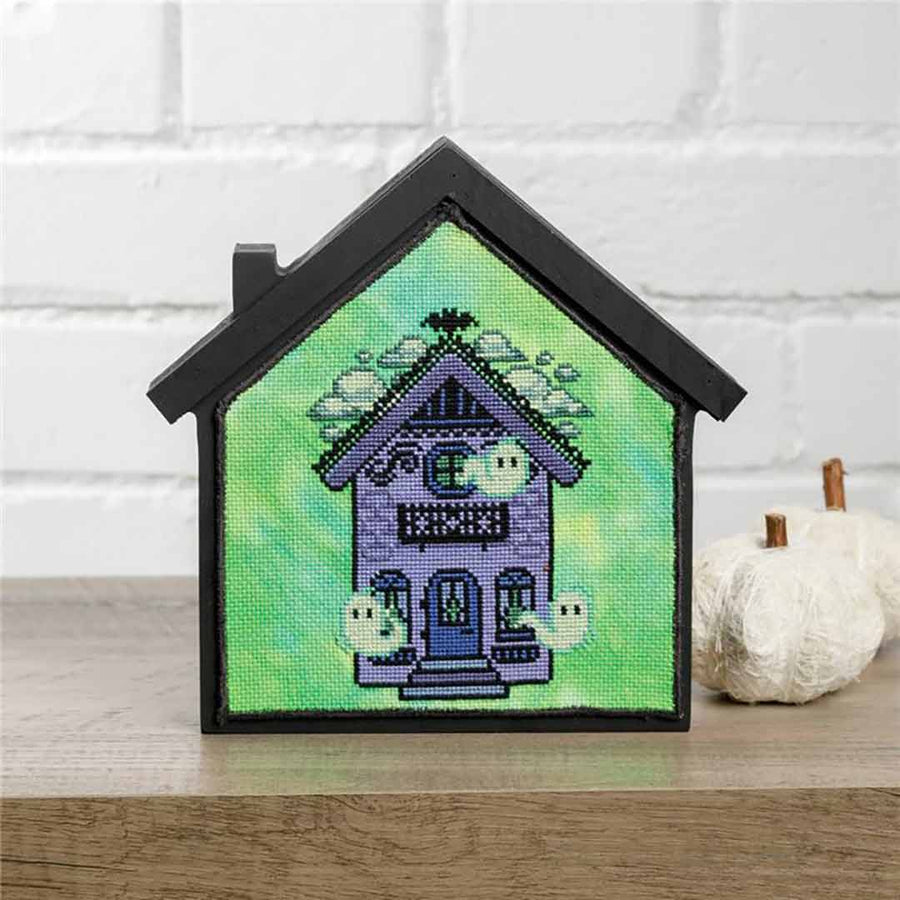 A stitched preview of the counted cross stitch pattern Nobody's Home - Haunted Halloween House by StitchSprout