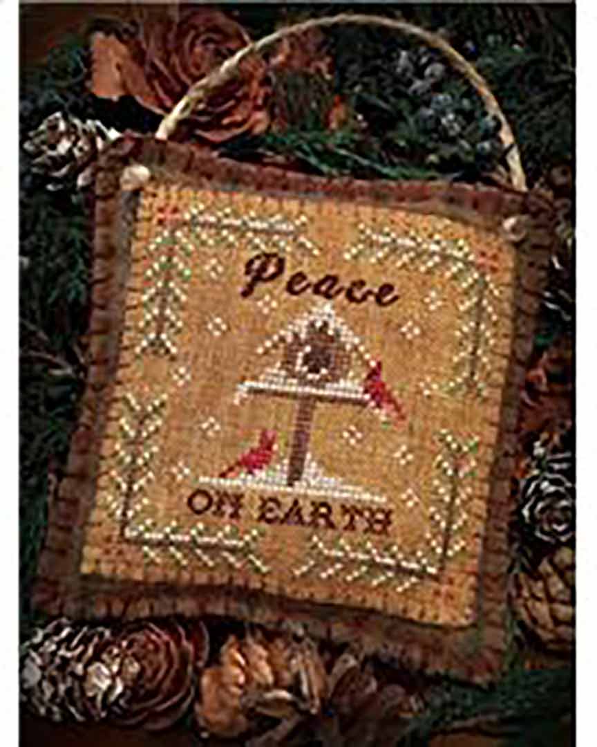 A stitched preview of the counted cross stitch pattern Peace On Earth by The Woolly Ewe