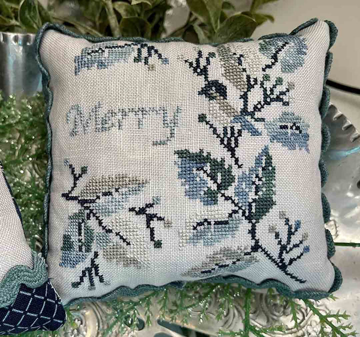 A stitched preview of the counted cross stitch pattern Peaceful Christmas Smalls by Jan Hicks Creates