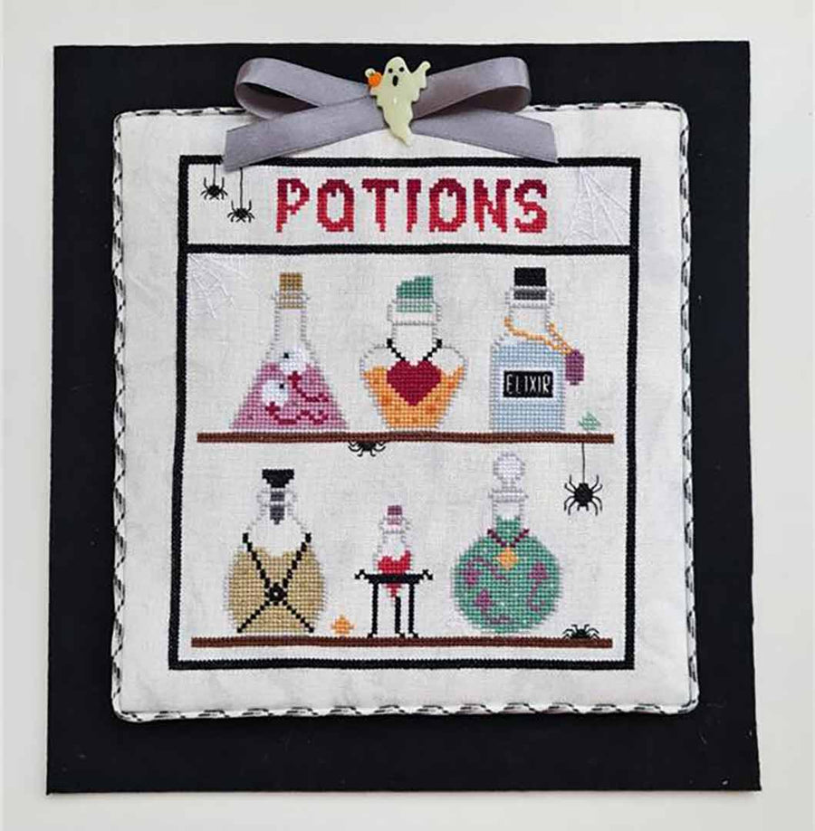 A stitched preview of the counted cross stitch pattern Potions by Kate Spiridonova