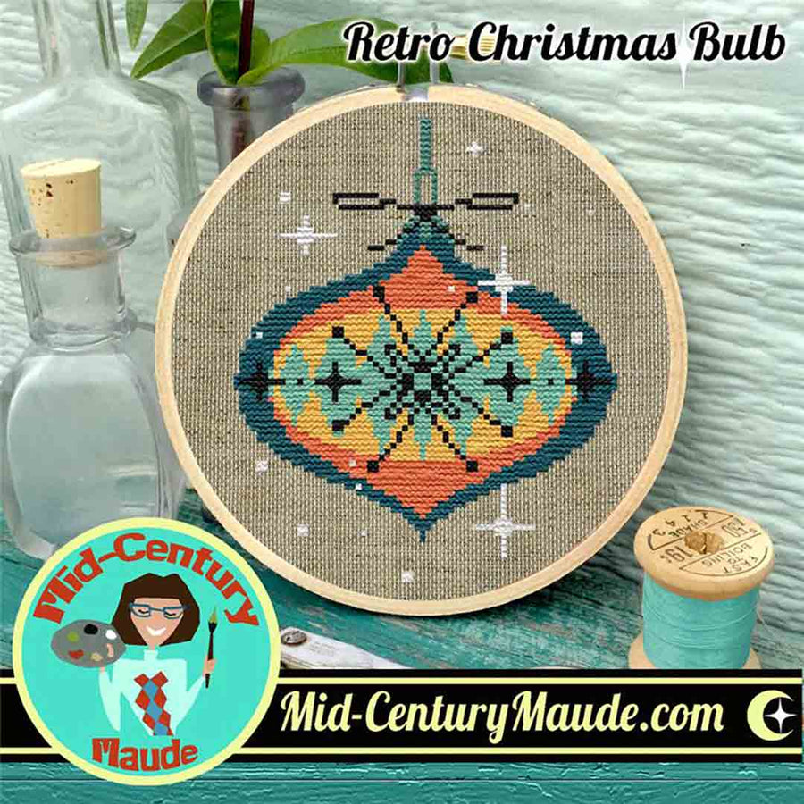 A stitched preview of the counted cross stitch pattern Retro Christmas Bulb by Mid-Century Maude