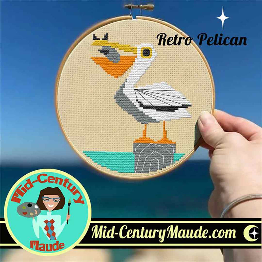 A stitched preview of the counted cross stitch pattern Retro Pelican by Mid-Century Maude