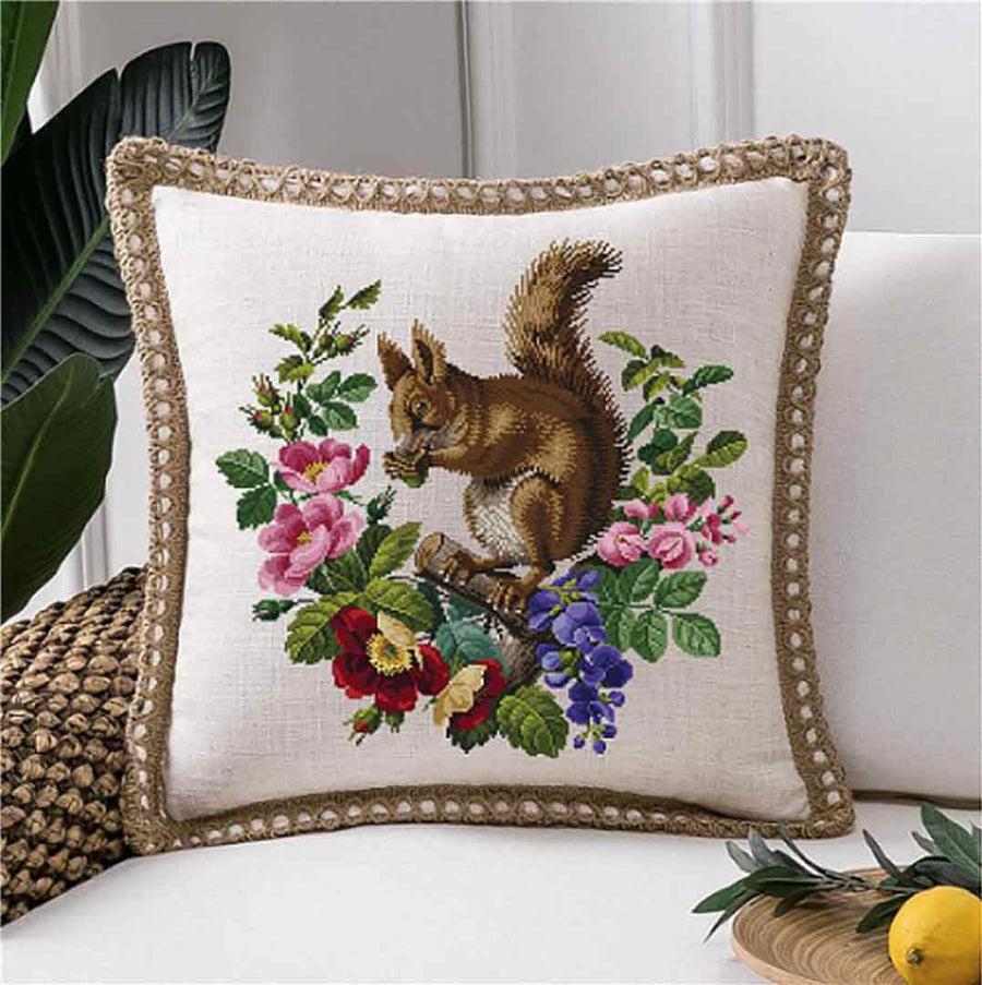 A stitched preview of the counted cross stitch pattern Roses & Squirrel-A by Antique Needlework Design