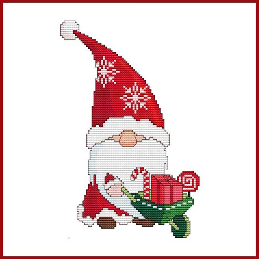 A stitched preview of the counted cross stitch pattern Santa Gnome With Gifts In Wheelbarrow by Marcia Manning