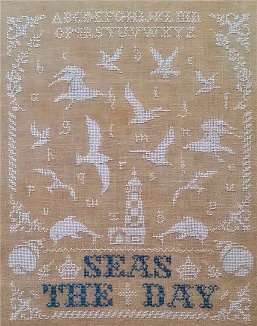 A stitched preview of the counted cross stitch pattern Seas The Day by Samplers and Primitives