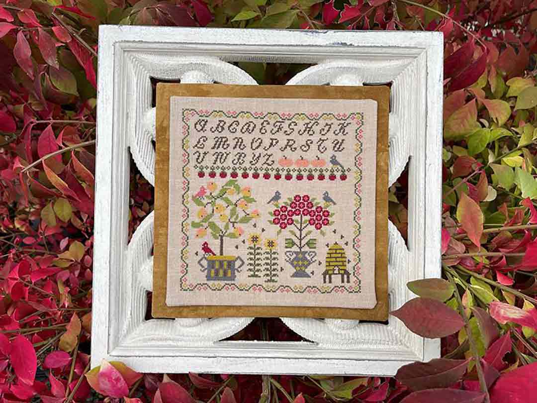 A stitched preview of the counted cross stitch pattern Season Of The Harvest by Jan Hicks Creates