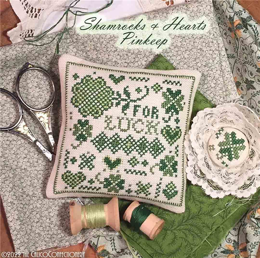 A stitched preview of the counted cross stitch pattern Shamrocks And Hearts Pinkeep by The Calico Confectionery