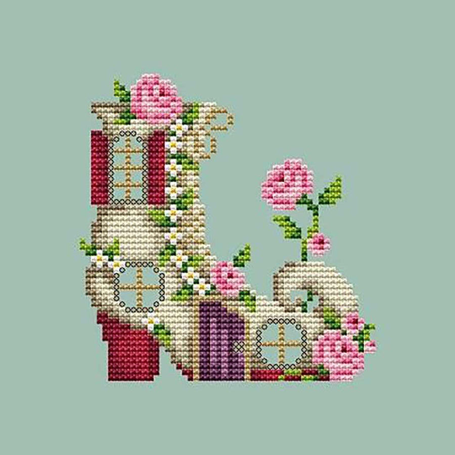 A stitched preview of the counted cross stitch pattern Shoe House by Shannon Christine Designs