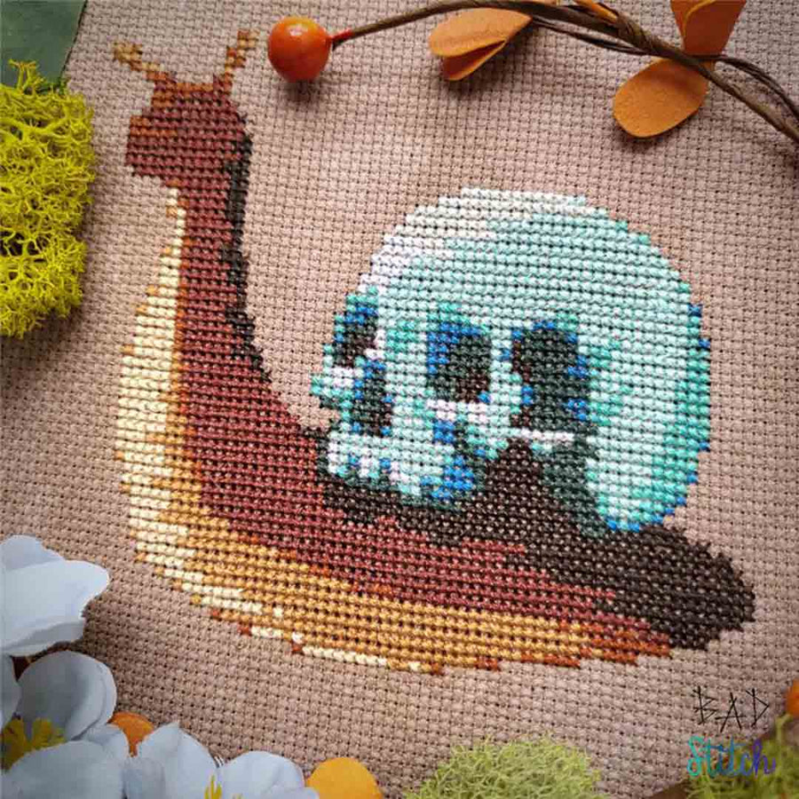 A stitched preview of the counted cross stitch pattern Snull by BAD Stitch