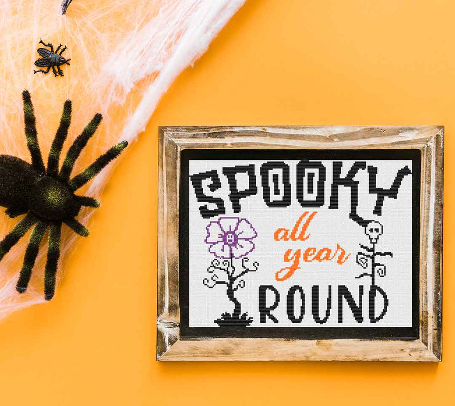 A stitched preview of the counted cross stitch pattern and kit "Spooky All Year" by Stitch Wit