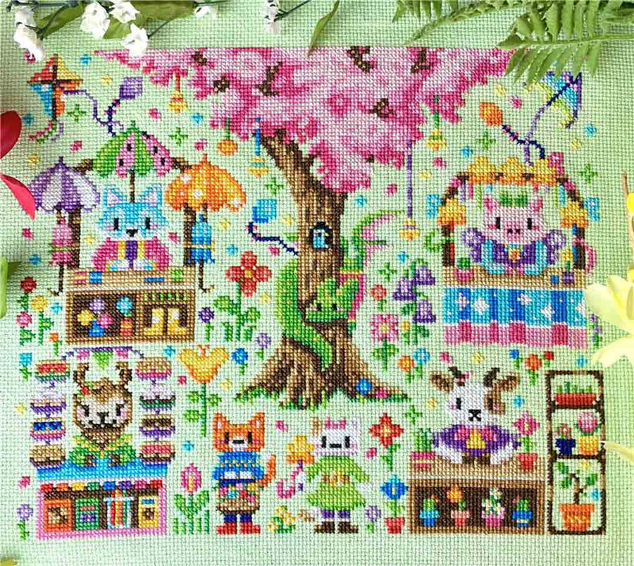 A stitched preview of the counted cross stitch pattern Spring Flower Festival by Flossy Fox Shop