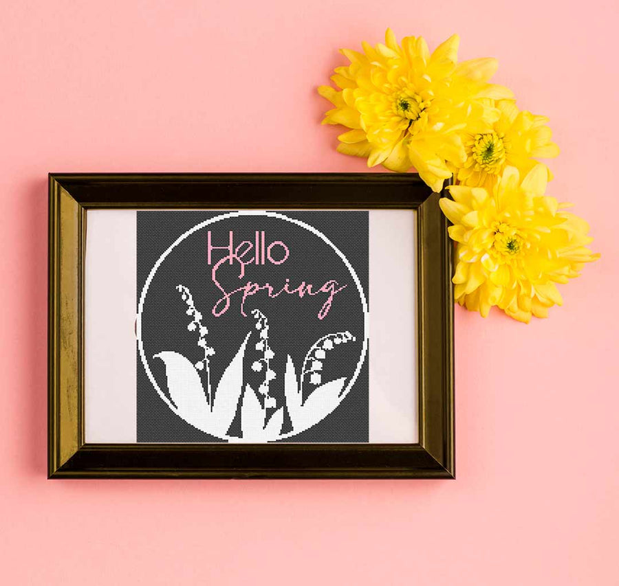 A stitched preview of "Spring Sign" counted cross stitch patter and kit by Stitch Wit