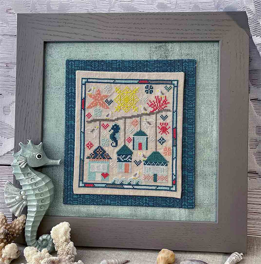A stitched preview of the counted cross stitch pattern Summer Cottages by Jan Hicks Creates