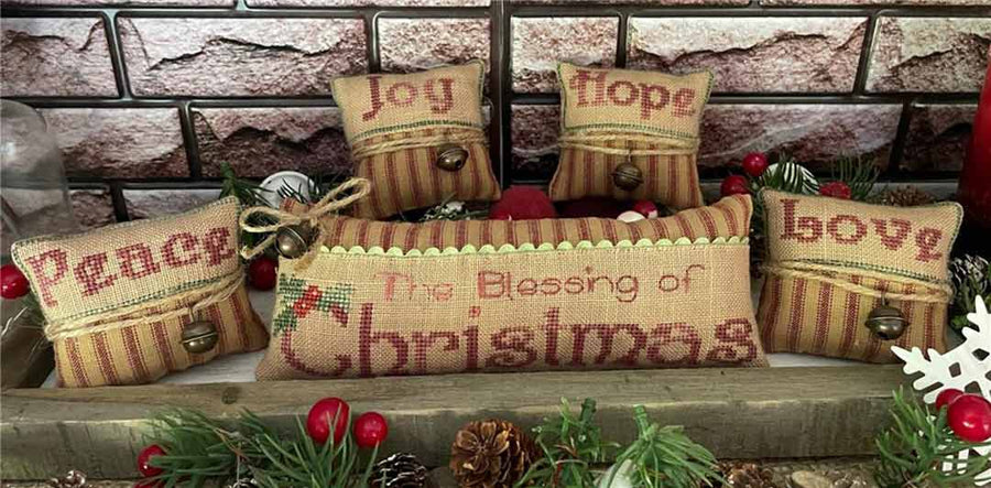 A stitched preview of the counted cross stitch pattern The Blessings Of Christmas by Mani di Donna Design