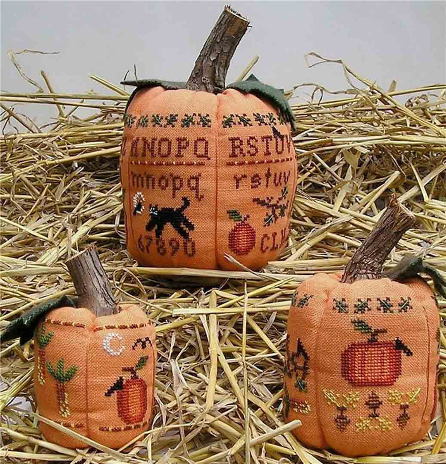 A stitched preview of the counted cross stitch pattern Three Pumpkins by Prairie Grove Peddler