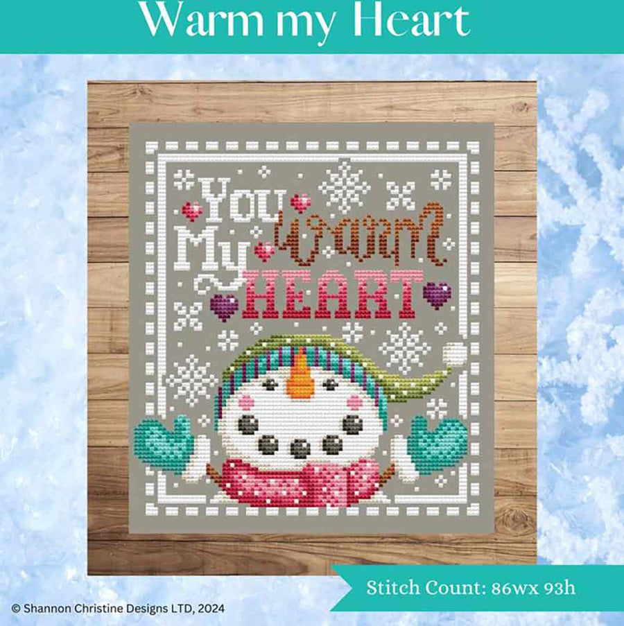 A stitched preview of the counted cross stitch pattern Warm My Heart by Shannon Christine Designs