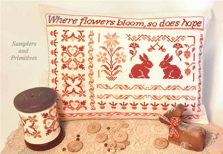 A stitched preview of the counted cross stitch pattern Where Flowers Bloom by Samplers and Primitives