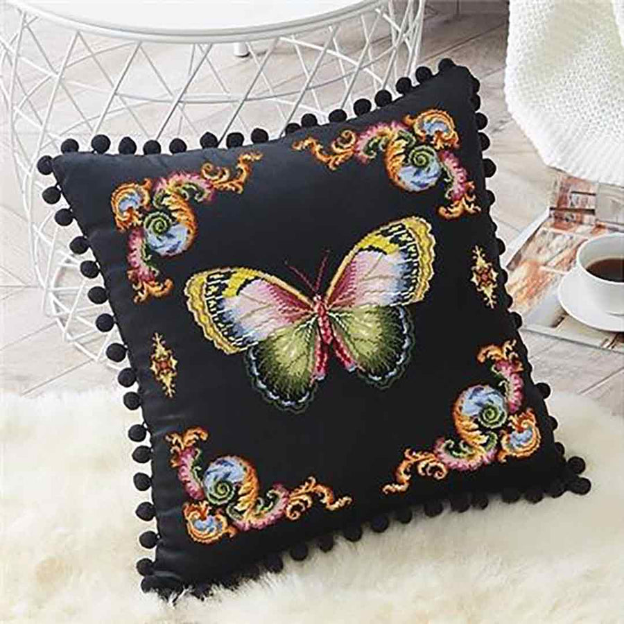 A stitched preview of the counted cross stitch pattern Antique Butterfly by Antique Needlework Design