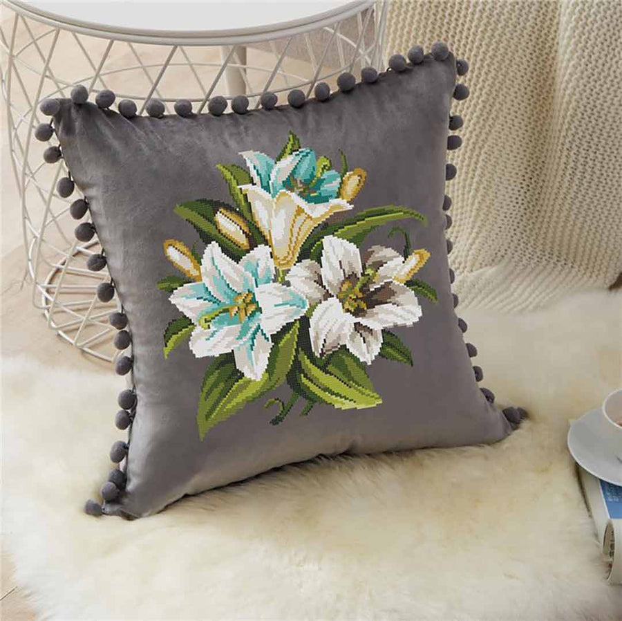 A stitched preview of the counted cross stitch pattern Antique Lily by Antique Needlework Design