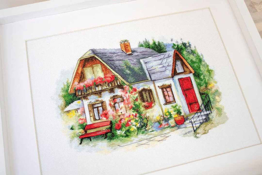 Stitched preview of Beautiful Country Home Counted Cross Stitch Kit