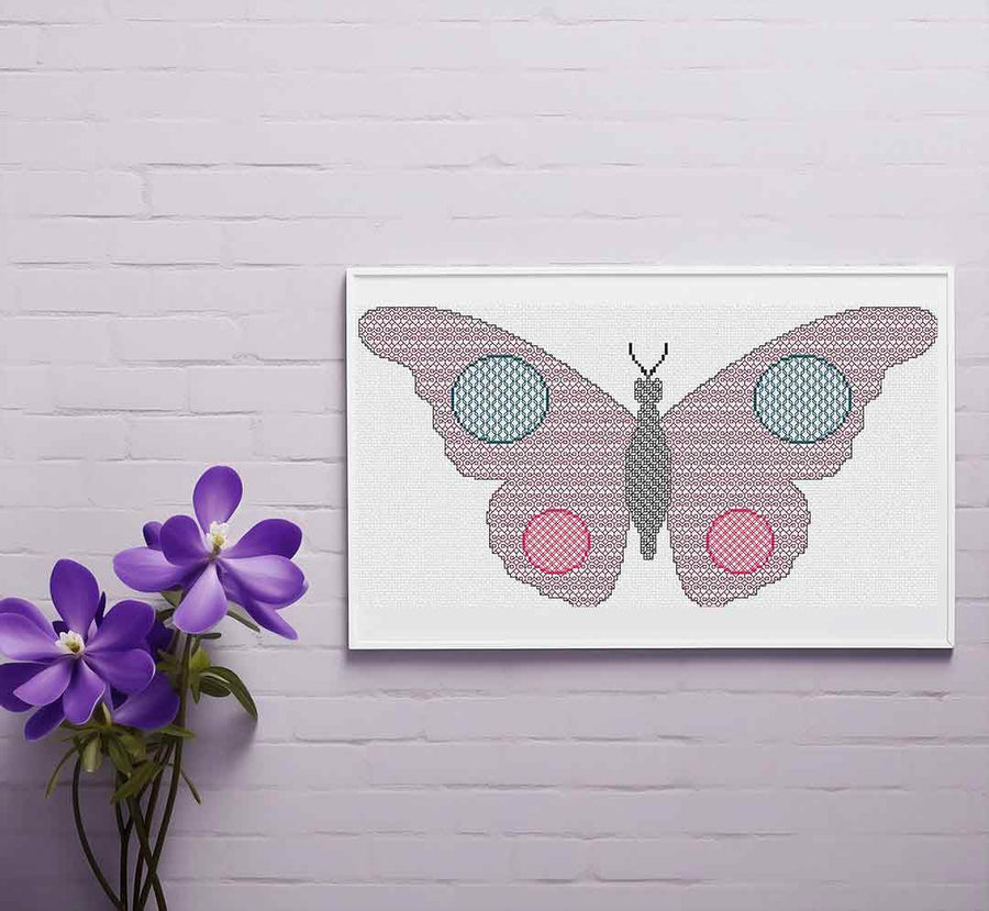 A stitched preview of Blackwork Butterfly: Counted Cross Stitch Pattern and Kit