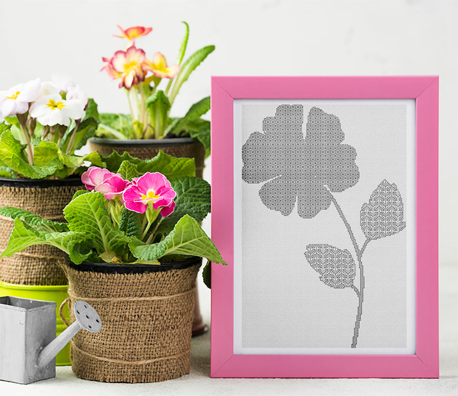 A stitched preview of Blackwork Flower: Counted Cross Stitch Pattern and Kit