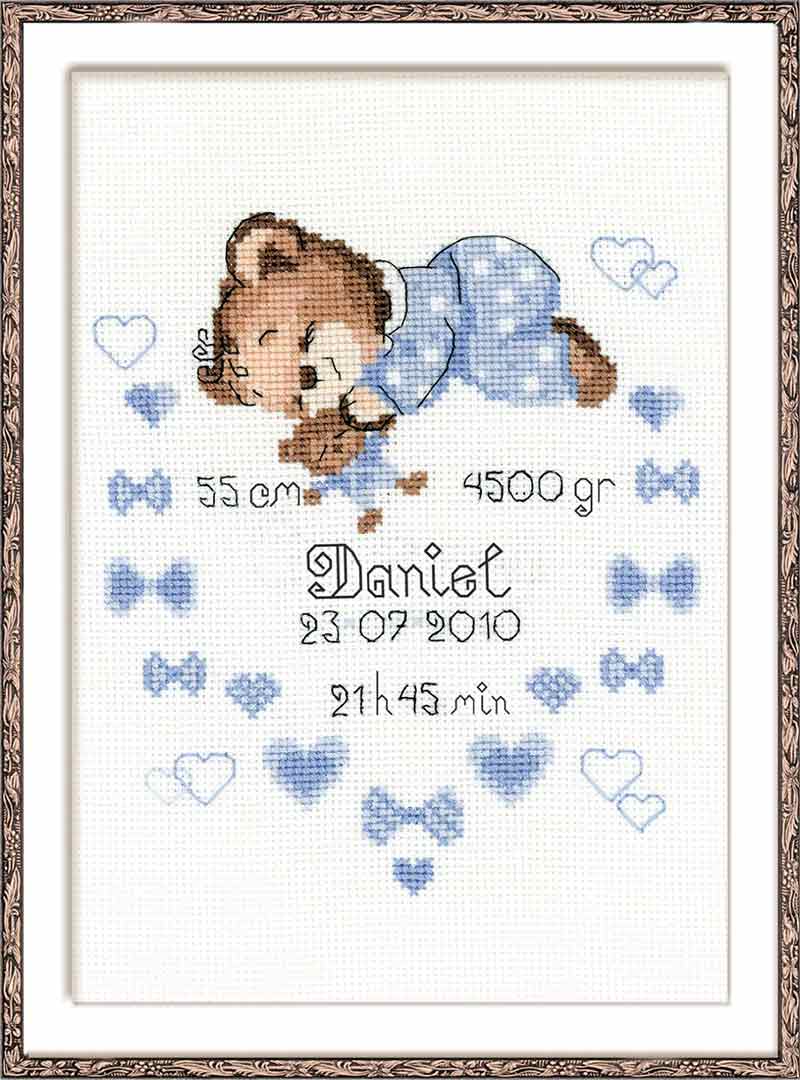 A stitched preview of Boys Birth Announcement Counted Cross Stitch Kit